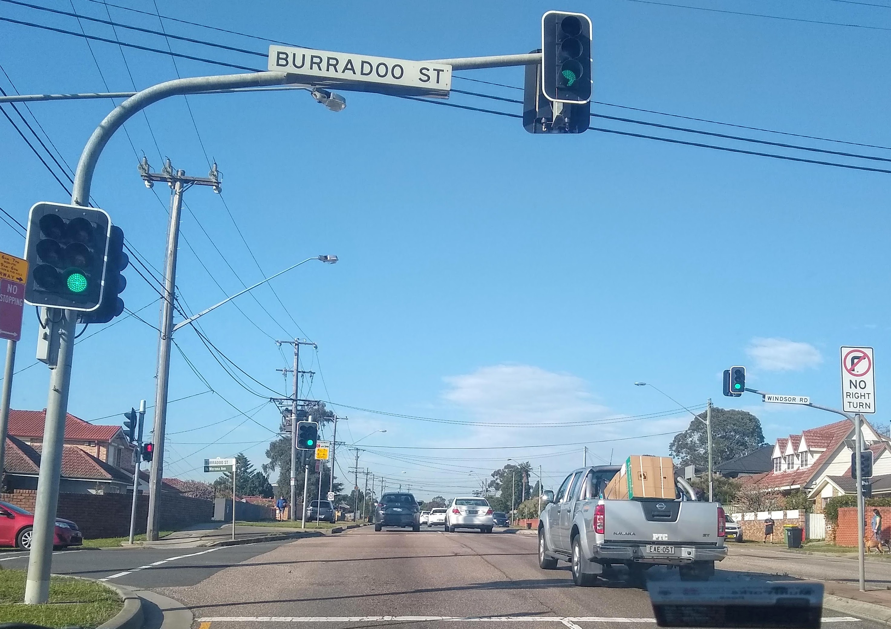 A Sydney suburban intersection. How many traffic lights do you see?